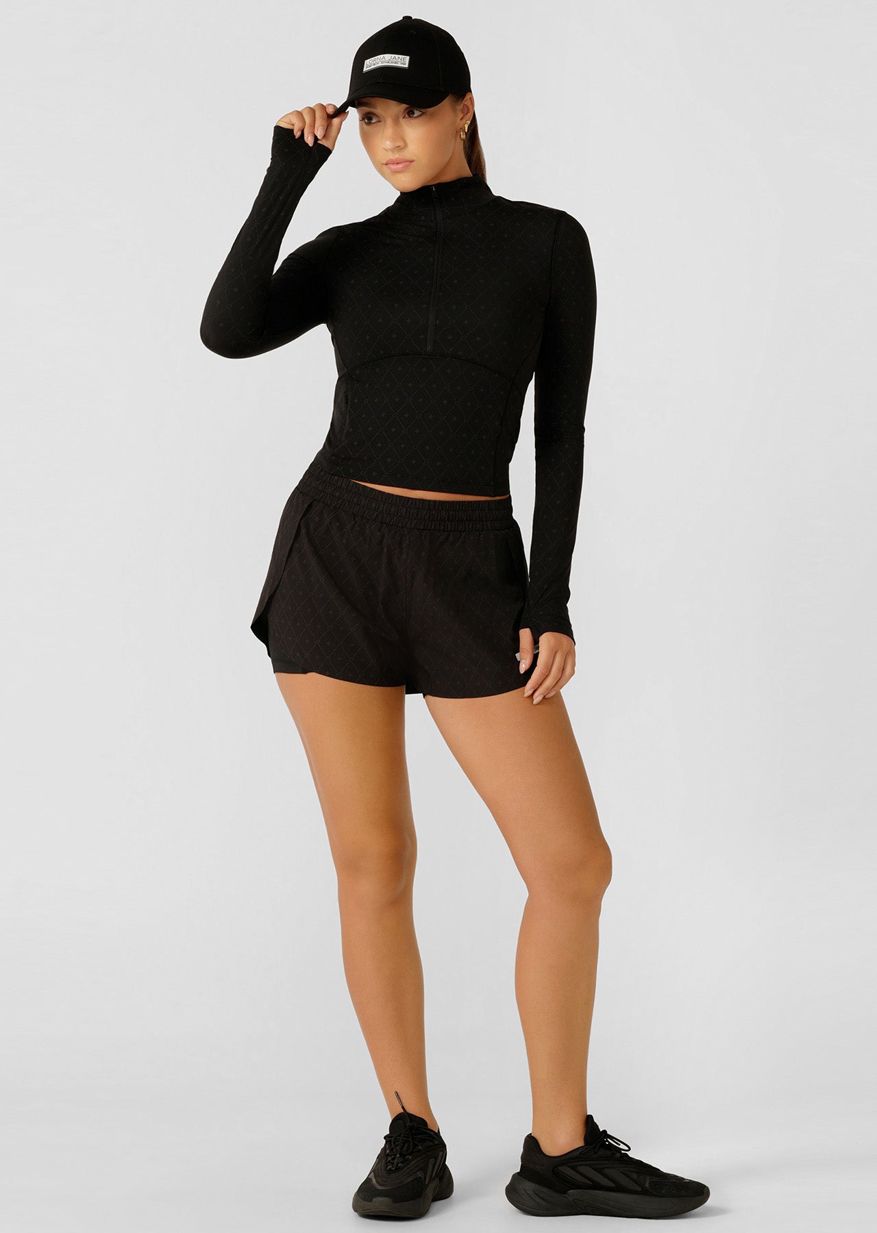 Lorna Jane High Definition Reflective 1/2 Zip Long Sleeve Top - Black Reflective Monogram Print